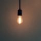 bright light bulb in dark room